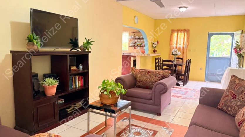 House for Sale in Lord's Bank Belize featuring a 3-bedroom concrete home and separate 1-bedroom rental home on one lot.