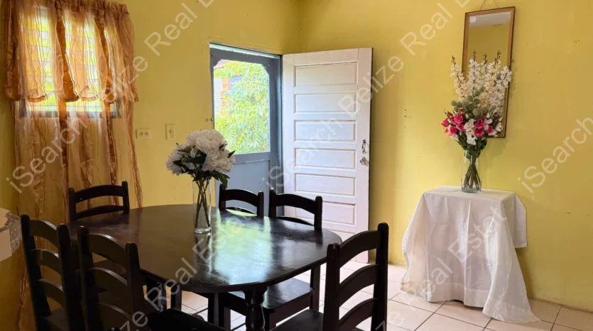 House for Sale in Lord's Bank Belize featuring a 3-bedroom concrete home and separate 1-bedroom rental home on one lot.