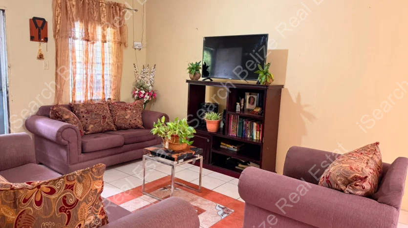 House for Sale in Lord's Bank Belize featuring a 3-bedroom concrete home and separate 1-bedroom rental home on one lot.