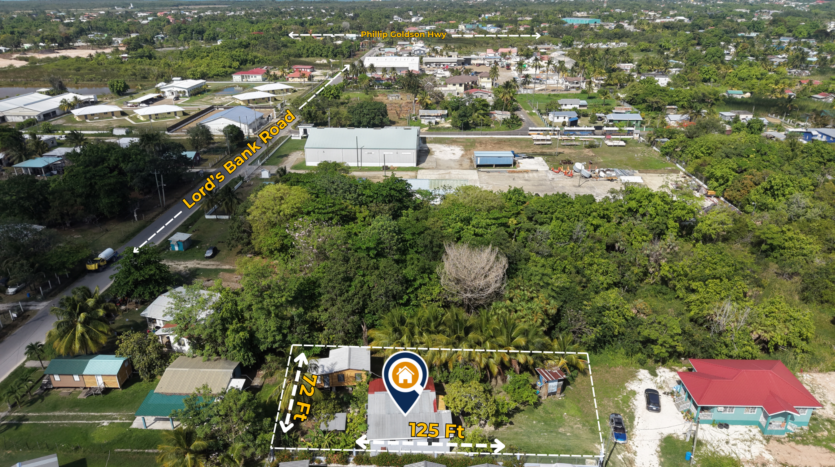 House for Sale in Lord's Bank Belize featuring a 3-bedroom concrete home and separate 1-bedroom rental home on one lot.
