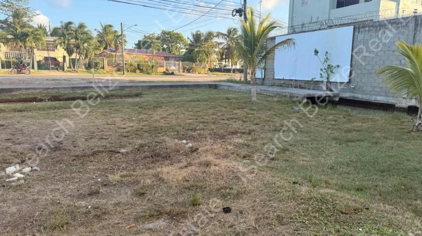 Cleared land for sale on George Price Highway Belize with 152 feet of highway frontage.